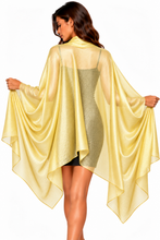 Load image into Gallery viewer, A woman shown from the back wearing a sheer, flowing pale yellow shawl wrap cape-style cover-up over a metallic olive-green dress, against a plain white background.
