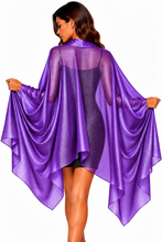Load image into Gallery viewer, A woman shown from the back wearing a sheer, shiny purple cape-style cover-up over a dark dress, holding the fabric out to the sides against a plain white background.