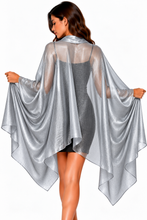 Load image into Gallery viewer, A woman shown from the back wearing a sheer, metallic silver cape-style wrap over a gray dress, holding the wide sleeves out against a plain white background.