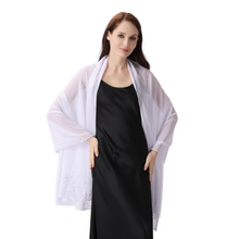 Load image into Gallery viewer, A woman modeling a lightweight white sheer open-front shawl or robe over a black slip dress, photographed against a plain white studio background.