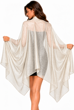 Load image into Gallery viewer, A woman shown from the back wearing a sheer,draped, white shimmer shawl wraps scarves pasminas over black dress