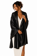 Load image into Gallery viewer, A woman modeling a black satin robe or kimono-style wrap over a white dress, photographed against a plain white studio background.