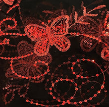 Load image into Gallery viewer, Close-up of a black fabric surface decorated with red sequined floral and butterfly embroidery.